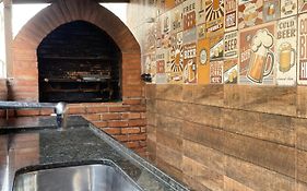 Apartamento Praia do Morro com Churrasqueira, Cozinha Gourmet e Wifi